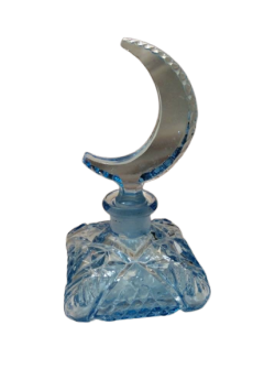 blue glass crescent moon statuette